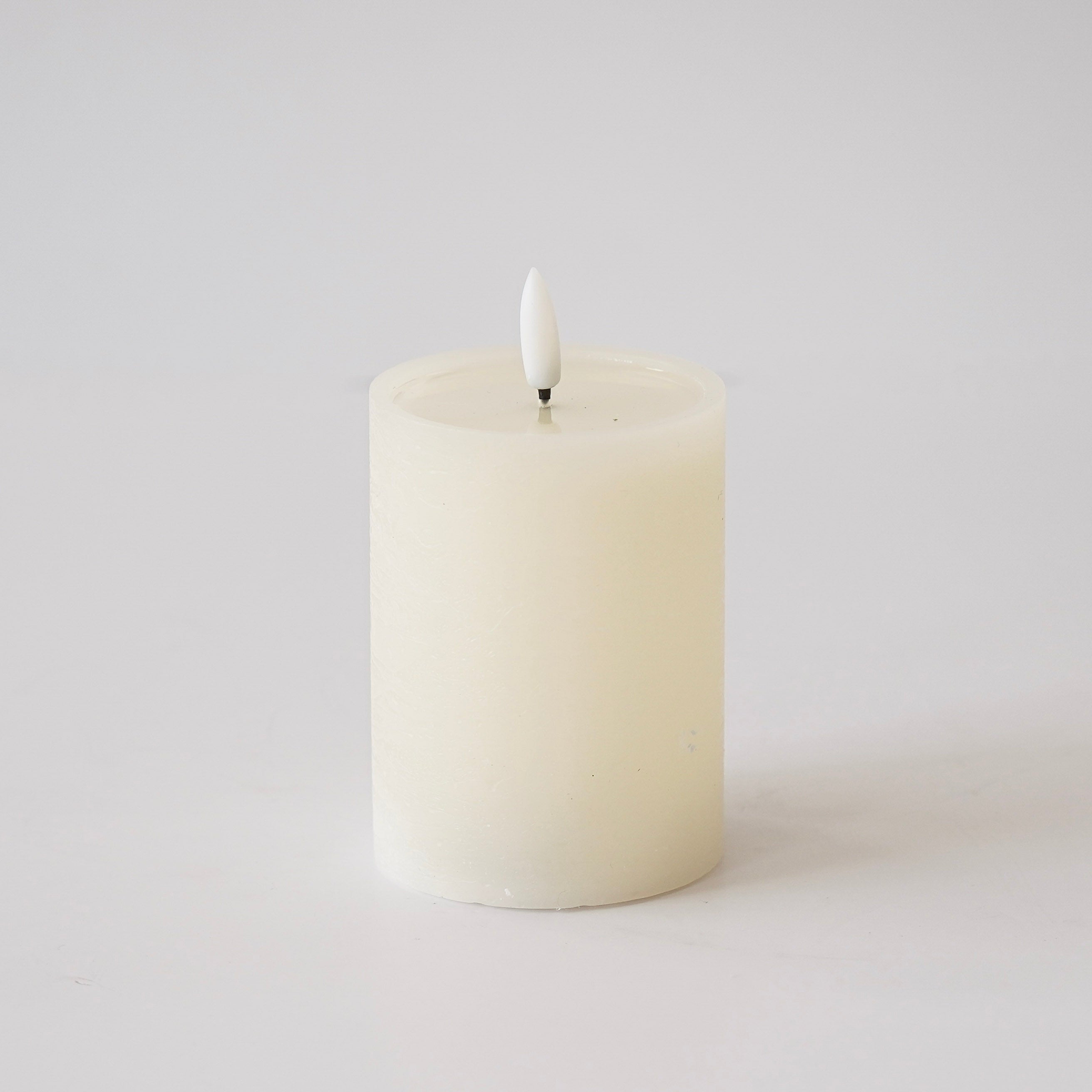 Textured Ivory Melting Effect Flameless Candle