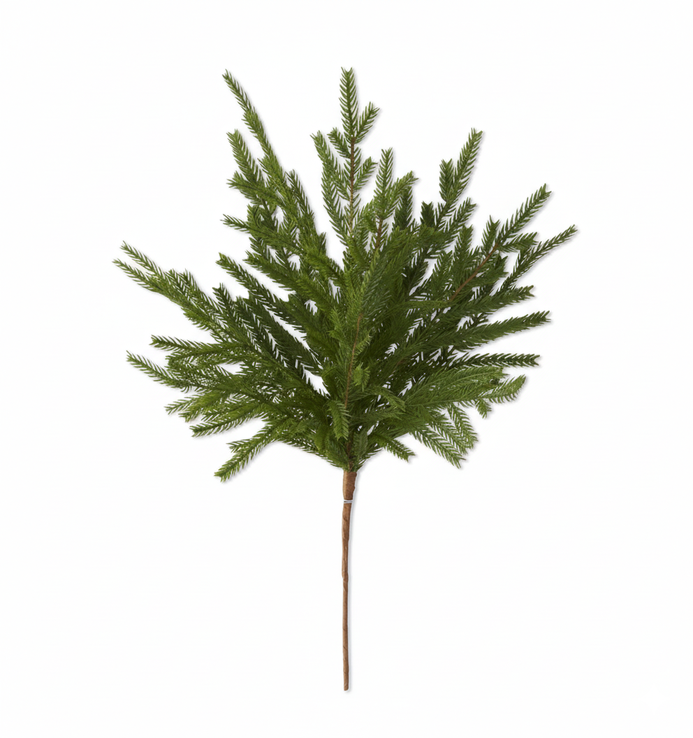Artificial Christmas tree branch on a white background