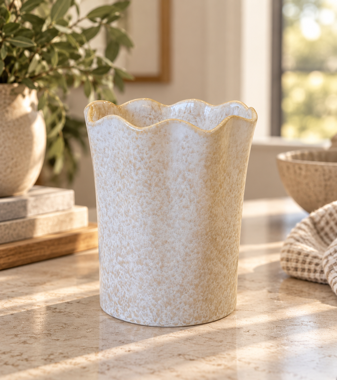 Ivory scalloped ceramic utensil holder and decorative vase with textured speckled finish and wavy rim