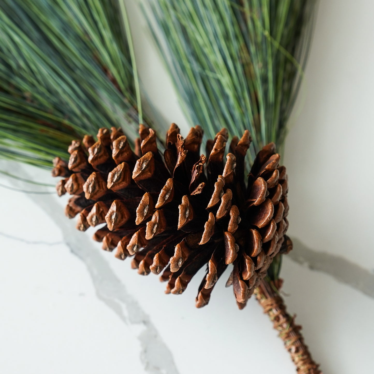 Faux Winter Greenery with Pinecones