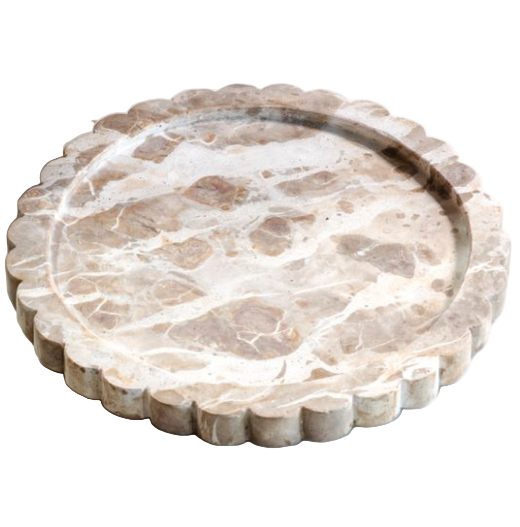 Round marble tray with a natural stone pattern on a white surface