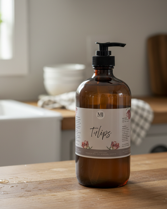 Amber bottle with a label on a wooden surface, with a blurred bathroom background