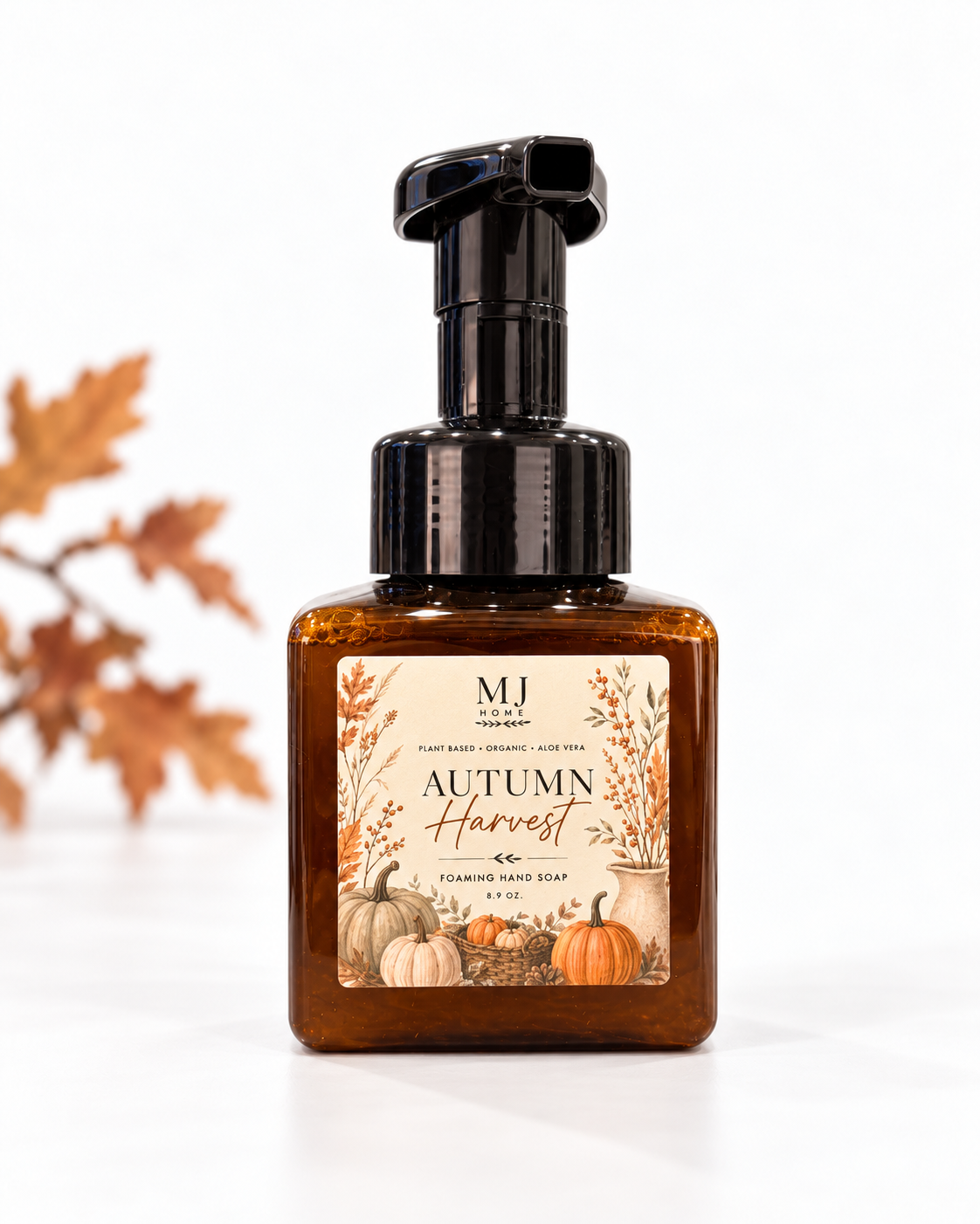 MJHome Autumn Harvest foaming hand soap on a clean white background with subtle autumn leaves