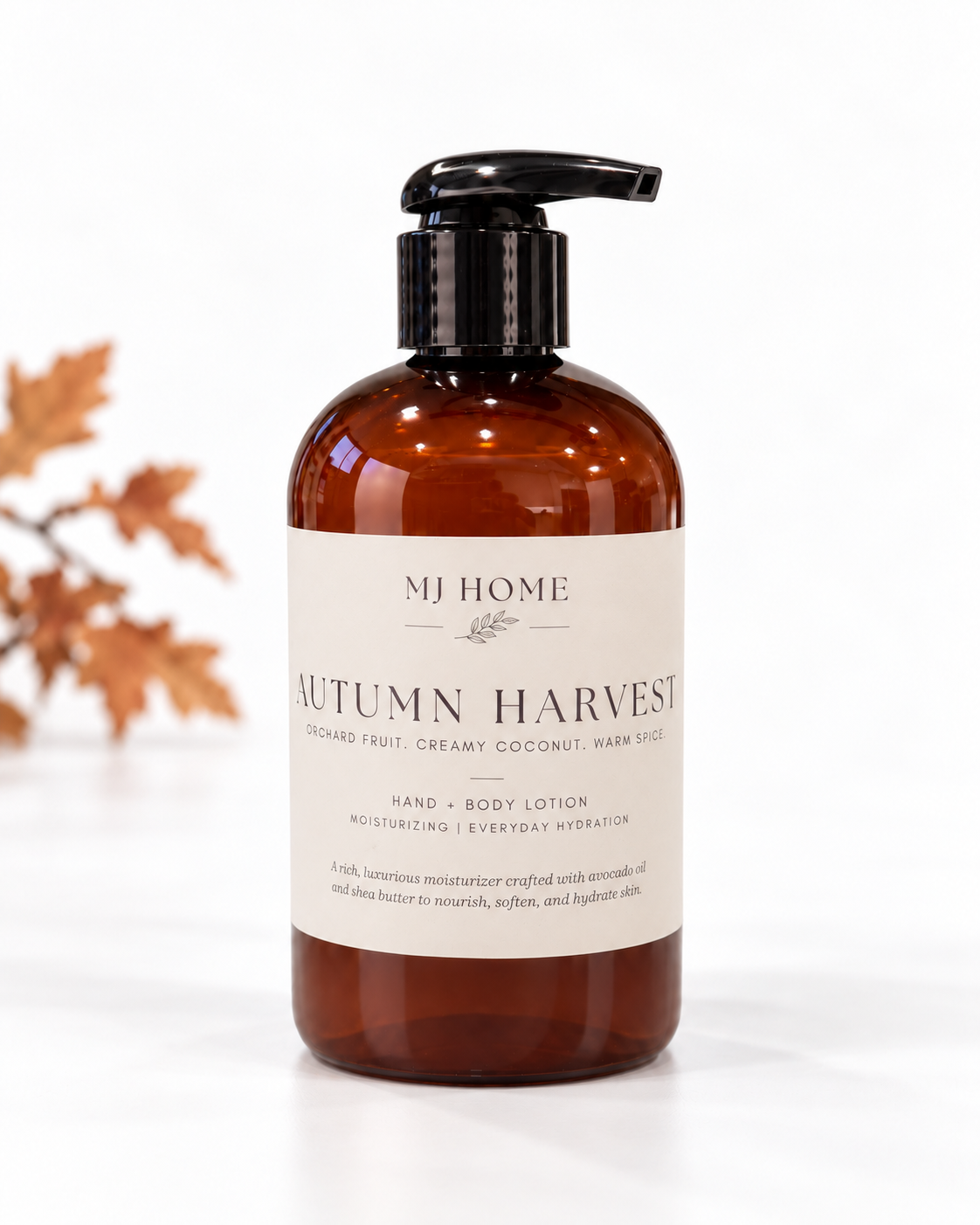 MJHome Autumn Harvest hand and body lotion on a clean white background with subtle autumn leaves