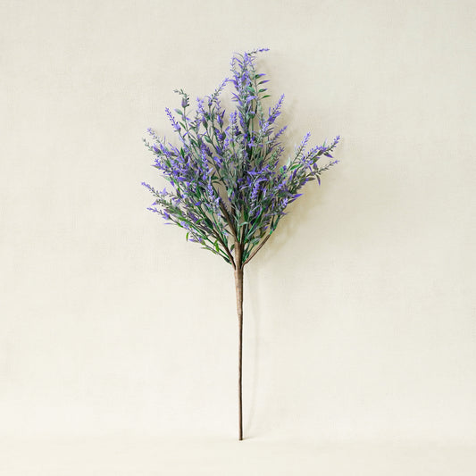 Artificial lavender plant on a beige background