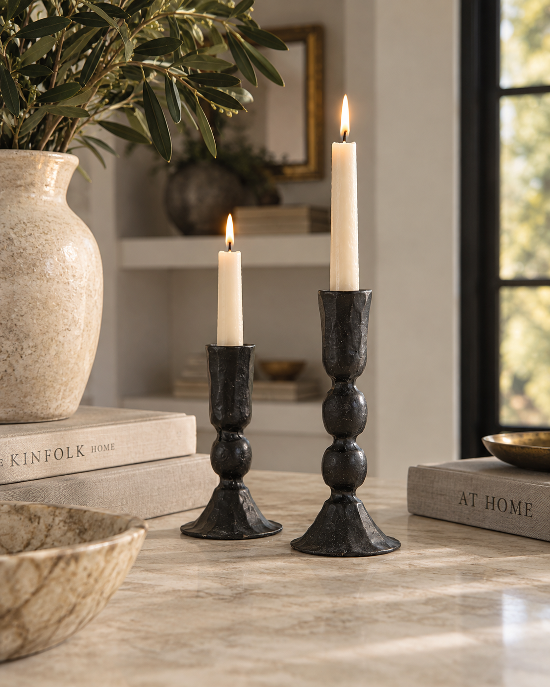 James Black Taper Candle Holder Set of two matte black iron candlesticks with stacked-ball details and graduated pedestal bases