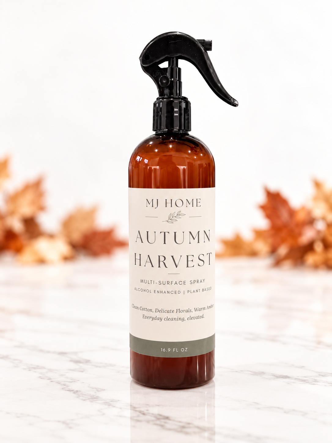 Autumn Harvest multi-surface spray with white background and autumn leaves